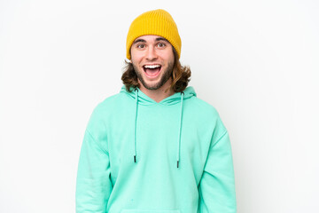 Young handsome man isolated on white chroma background with surprise facial expression