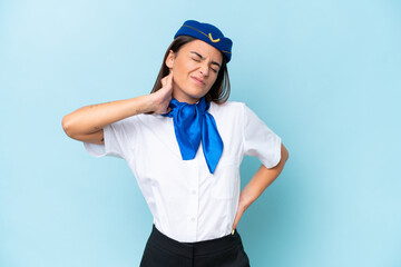 Airplane stewardess caucasian woman isolated on blue background with neckache