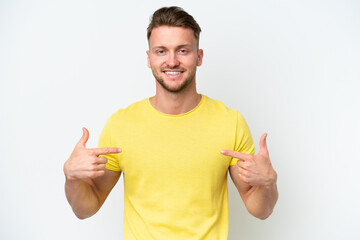 Young blonde caucasian man isolated on white background proud and self-satisfied