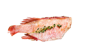 Raw red sea perch on a stone Board with thyme. Isolated, transparent background