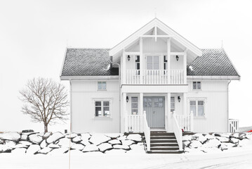 Traditional house in Lofoten, of Norway, Europe. Norwegian architecture in winter background.