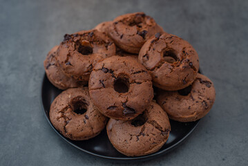 sweet home made chocolate chip donuts on a table