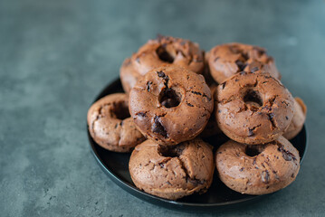 sweet home made chocolate chip donuts on a table