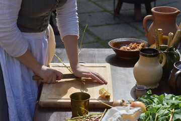 Preparing a medieval meal.