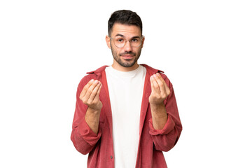 Young handsome caucasian man over isolated chroma key background making money gesture but is ruined