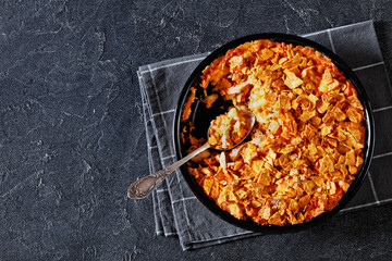 nacho chicken cheese casserole in baking dish