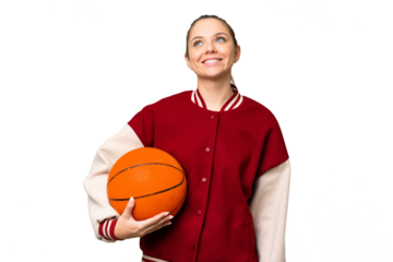 Young blonde woman playing basketball over isolated chroma key background thinking an idea while looking up