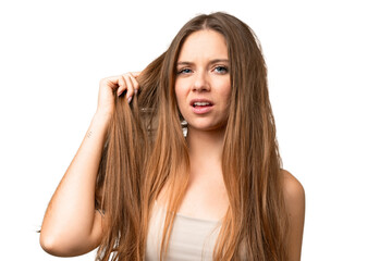 Young blonde woman over isolated chroma key background with tangled hair. Close up portrait