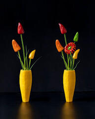 Flower arrangement of sweet peppers and zucchini.