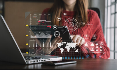Woman hand Project manager working and update tasks and Gantt chart scheduling virtual diagram.with smart phone, tablet and laptop in office.