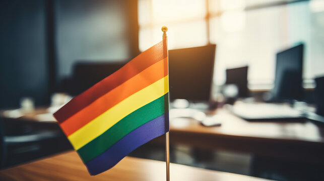 Mini flag office decoration with LGBT colors.