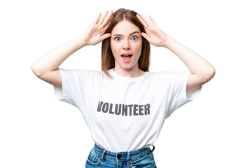 Young volunteer woman over isolated chroma key background with surprise expression