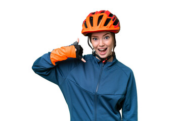 Young cyclist woman over isolated chroma key background making phone gesture. Call me back sign - obrazy, fototapety, plakaty