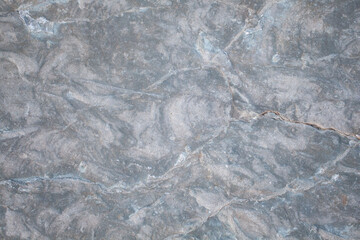 White and gray stone, plaster surface, background, pattern with cracks