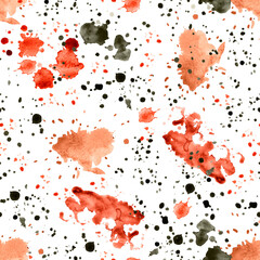 Splattered watercolor paint black and red in the form of spots and streaks