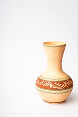 Clay jug isolated on white background