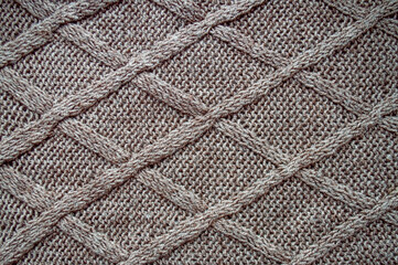 Handmade knitted background with macro weave threads.