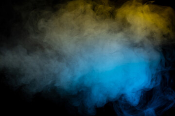 Blue and yellow steam on a black background.