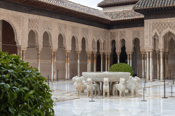 Court of the Lions (Palace of the Lions) of Alhambra -- a palace and fortress complex located in Granada, Andalusia, Spain. Islamic Moorish architecture.