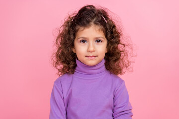 Photo of pretty funny little child dressed purple pullover smiling isolated pink color background