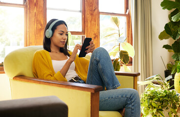 Woman, smartphone and headphones, social media and listening to music with communication and...