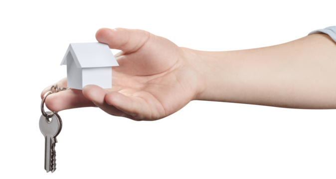 Hand holding keys and a small house, cut out