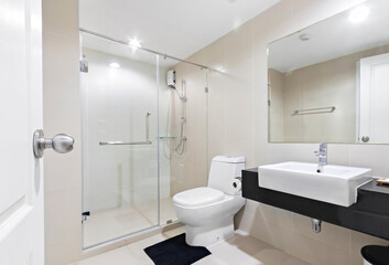Fototapeta na wymiar white clean bathroom in modern condominium