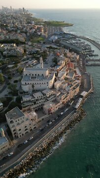 Aerial video over the old city of Jaffa during sunset