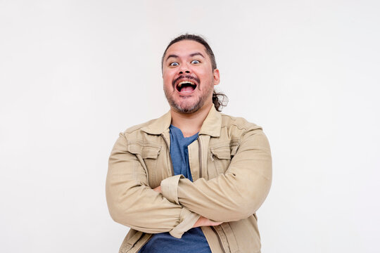 A nefarious man laughing, fulfilling his plan, and revealing his true colors. Isolated on a white background.