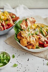 Closeup of healthy salad with vegetables and sauce