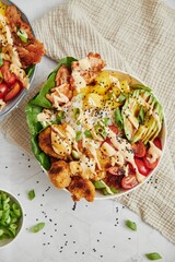 Closeup of healthy salad with vegetables and sauce