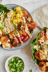 Closeup of healthy salad with vegetables and sauce