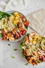 Closeup of healthy salad with vegetables and sauce