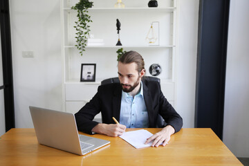 Business discussions. Shot of business people discussing and  brainstorming in an office