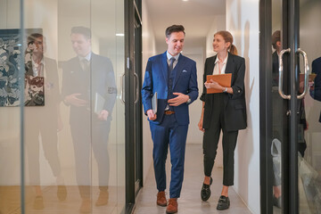 Fototapeta premium Business discussions. Shot of business people discussing and brainstorming in an office