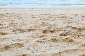 Fototapeta na wymiar Beach sand background. Sand beach texture. Beach sand background 