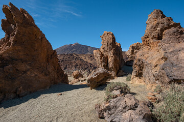 Fototapeta premium Huge amazing panorama landscape of hills and mountains in the desert of el teide volcano in tenerife, canarias, spain