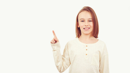 Boy gesturing new idea. Emotional portrait of happy teen boy over white background with copy space.
