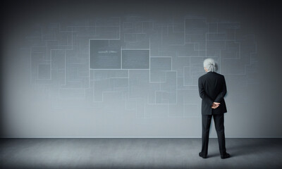 Fototapeta premium Back view of businessman looking at chalkboard with mathematical formulas on it - AI Generated