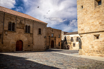 View of several medieval palaces from the Plaza de los Golfines in Caceres, Spain declared a world heritage city