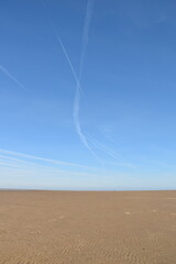 Airplanes flying in the sky with a clear blue sky. 