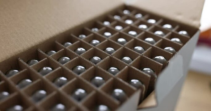 Paper box with glass bottles of wine 4k movie. Reliable packaging for storing fragile goods concept