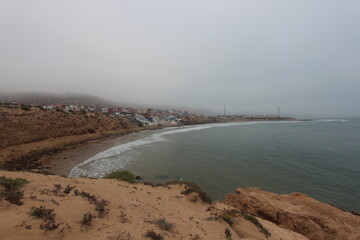 view of the cliff of Imsouane, one of the Moroccan towns with an amazing view of the sea and the sunset