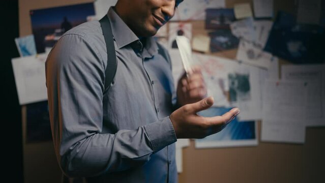 Corrupt detective accepting bribes in his office, police misconduct, bribery