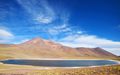 Laguna Miniques, one of stunning deep blue lagoon on the altiplano of Antofagasta region in northern Chile, South America