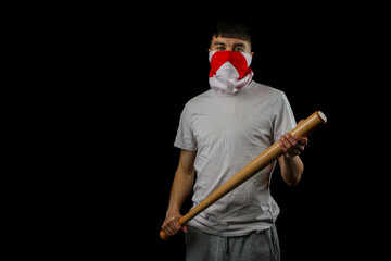 Teenage boy england mask baseball bat