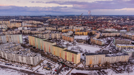 A block of flats in the Zaspa district of Gdańsk in a winter atmosphere. Drone view.

 - obrazy, fototapety, plakaty