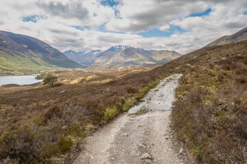 Fototapeta na wymiar Walking on the Kintail Way at Glen Affric in the Scottish Highlands
