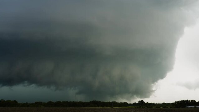  Powerful Supercell Thunderstorm Spins Across Open Fields