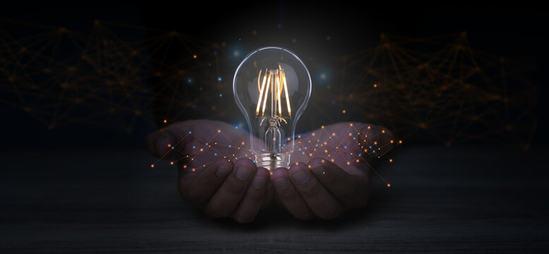 Creative solution or idea for web banner design or landing page template for creative agency with hands coming out of the screen with light bulbs and colorful abstract geometric shapes and lead lines.